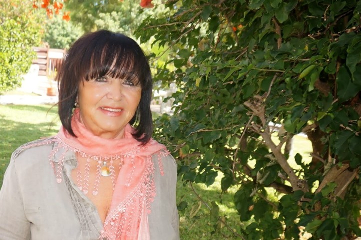 isolde in pink looking  young